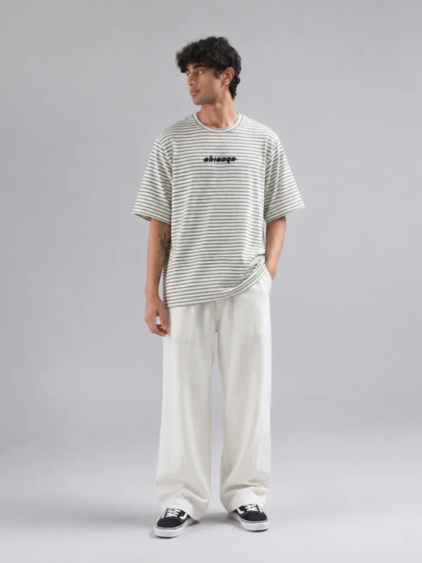 Puma_file_00000000b64871faacb49e35f6faefd5 Men’s "High Roller" Graphic Print Striped Oversized T-Shirt
